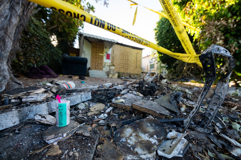 The scene where Anne Heche crashed a car into a house on Aug. 5, as seen one week later on Aug. 14. 