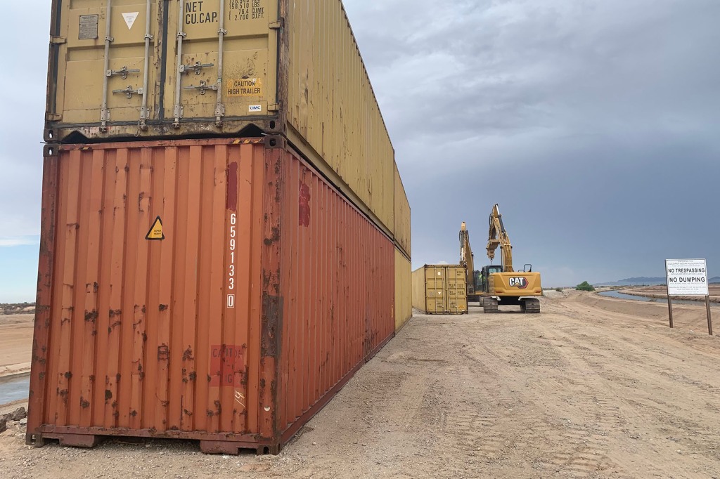 The wall will be made with 20-foot-high shipping containers.