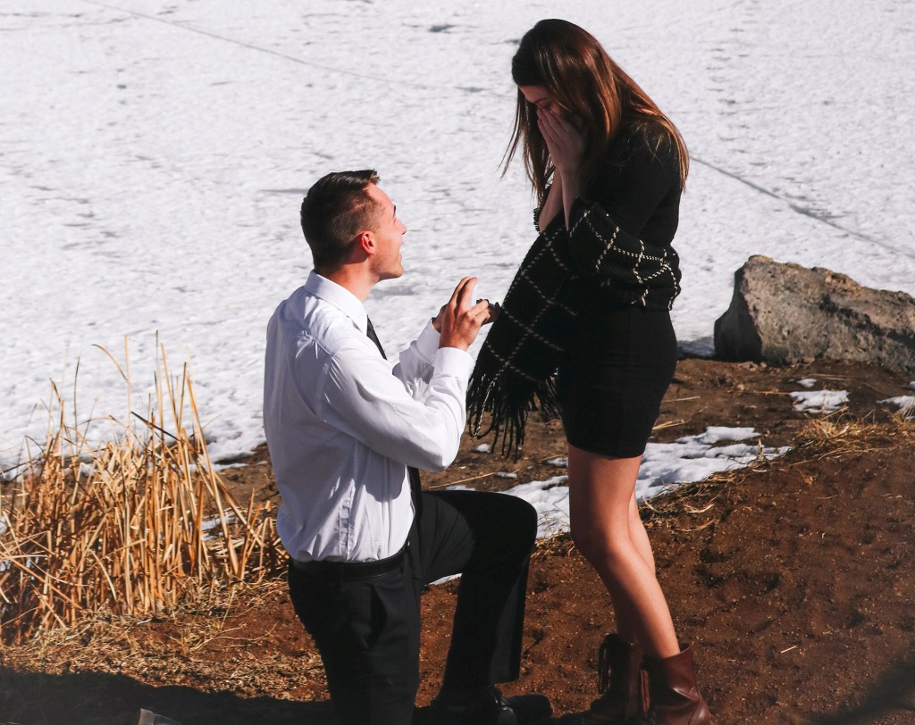 Christian popped the question while at a frozen lake in January 2021.