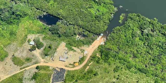 An illegal road inside a protected area called Terra do Meio Ecological Station in Para state, in the Brazilian Amazon, pictured here on May 2, 2022, has come under scrutiny from environmentalists who claim the road will lead to further deforestation by making the surrounding forests more accessible.