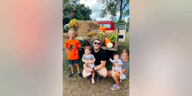 Jared Bridegan with his four children.