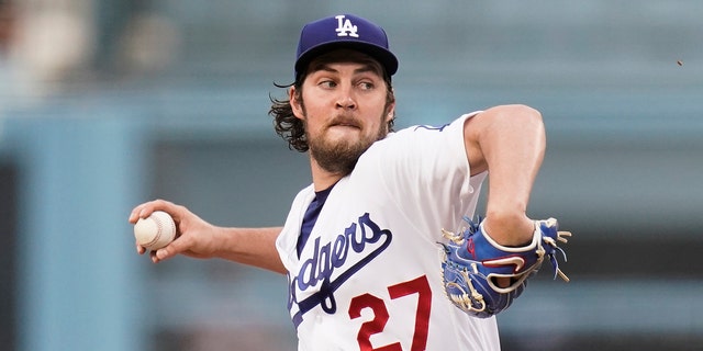 Los Angeles Dodgers starting pitcher Trevor Bauer throws against the San Francisco Giants during a game June 28, 2021, in Los Angeles. 