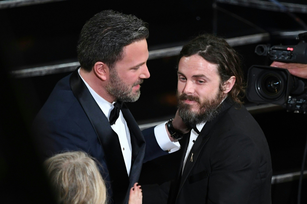 Ben Affleck with Casey Affleck at an awards ceremony