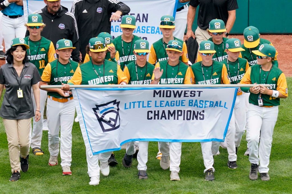 The Midwest Region Champion Little League team from Davenport, Iowa, participates in the opening ceremony of the 2022 Little League World Series baseball tournament in South Williamsport, Pa., Wednesday, Aug 17, 2022.