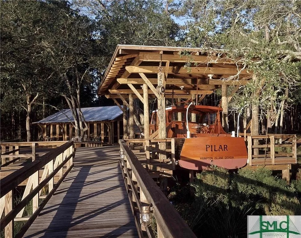 A bridge leading to the cottage structure.