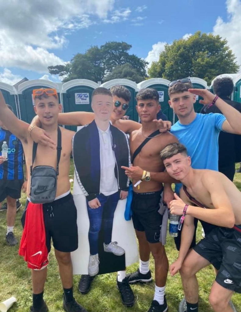 Ben's friends are seen with the cutout of the late teen, who was tragically killed in a car crash. 