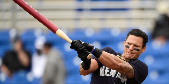 Derek Dietrich of the New York Yankees warms up before a game during spring training at TD Ballpark March 21, 2021, in Dunedin, Fla.