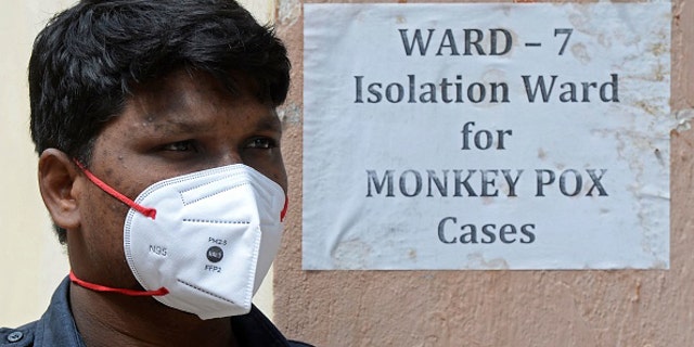 A man is shown in the "isolation ward" for monkeypox cases at a clinic in India.