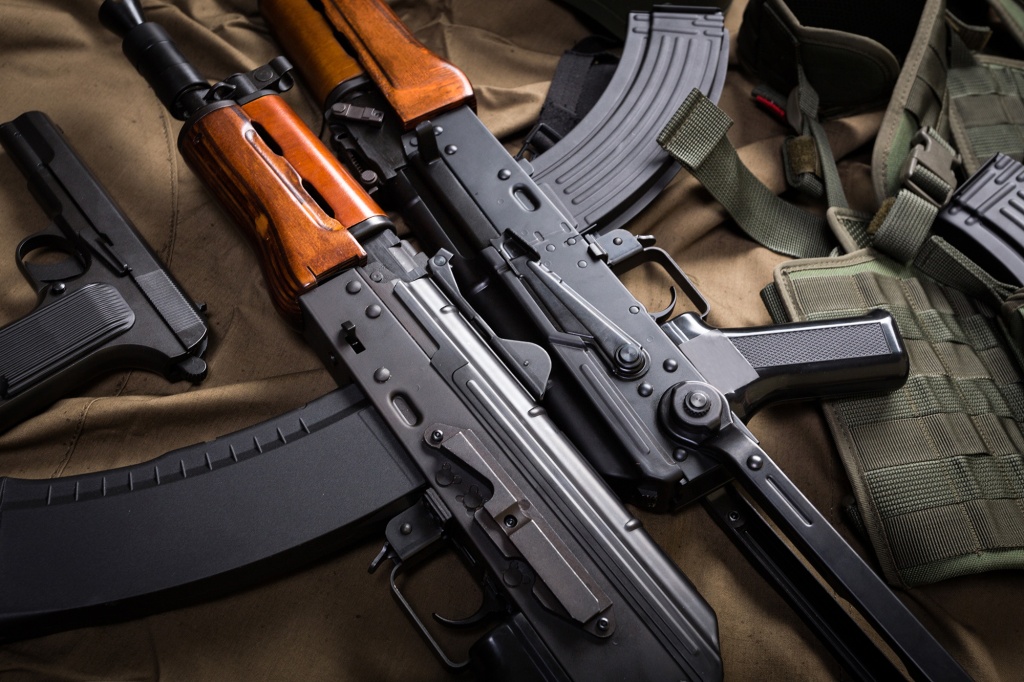Two AK-47s are pictured (above center). According to Britannica, the rifle is "possibly the most widely used shoulder weapon in the world."