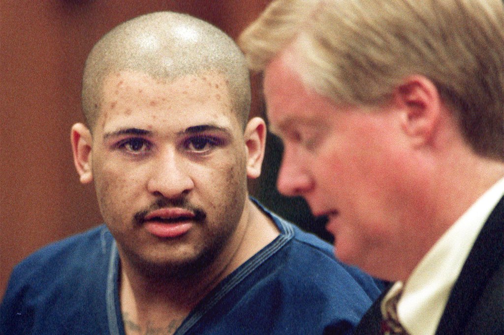Raymond Oscar Butler, left, with his attorney, James Hallett, in a Long Beach courtroom where he was sentenced to death for the 1994 execution style murders of two Marymount College students during a car jacking.