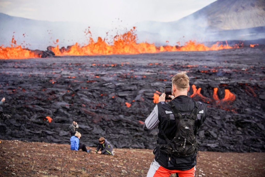 Tourists have flocked to witness lava flowing on Mount Fagradalsfjall in Iceland.