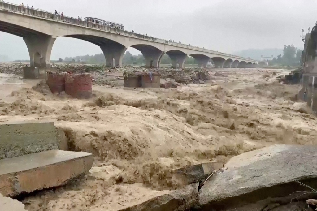 A general view of strong currents in the Chakki river following heavy rains in Kangra, Himachal Pradesh, India on Aug. 20, 2022.