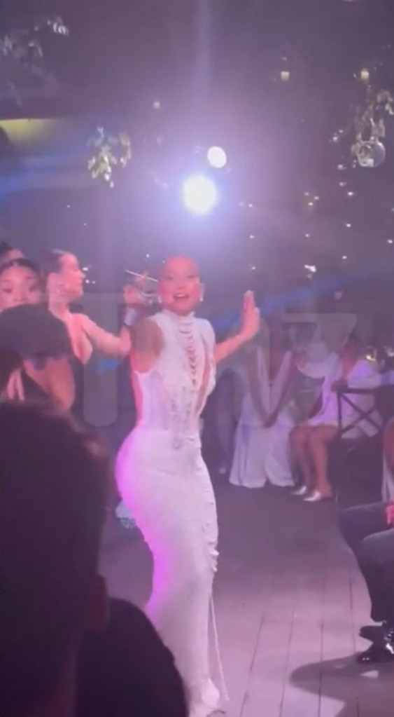 Jennifer Lopez performs at her wedding.