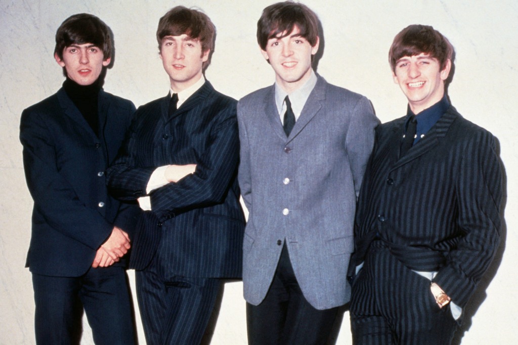 The Beatles posing together in 1965. From left to right: George Harrison, John Lennon, Paul McCartney and Ringo Starr.