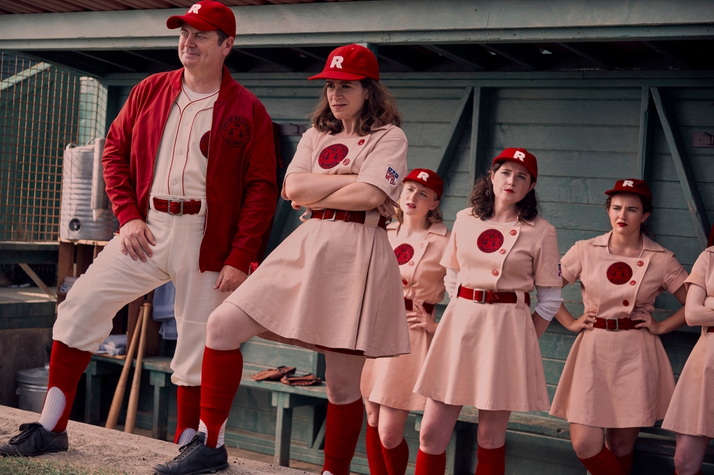 Dove (Nick Offerman), Carson (Abbi Jacobson) and some team members on "A League of Their Own." 