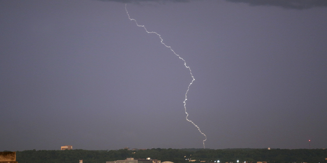 Lightning strikes the sky above the Jefferson Memorial after a severe storm in Washington on June 23, 2015.