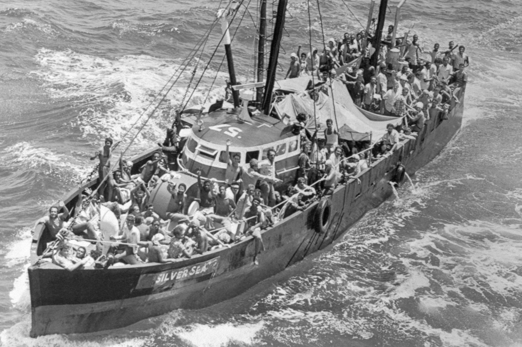 A fishing boat loaded with Cuban refugees heads towards Key West in 1980.