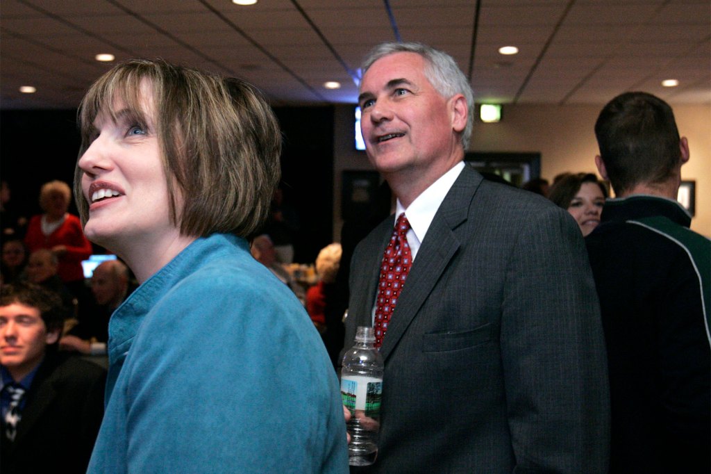 State Sen. Tom McClintock, the Republican candidate for the 4th Congressional District, and his wife, Lori, left, smile as they watch election returns are posted at his election night party in Roseville, Calif., Tuesday, Nov. 4, 2008. 