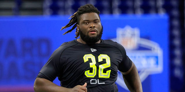 Marcus Mckethan of the North Carolina Tar Heels runs the 40-yard dash during the NFL Combine at Lucas Oil Stadium March 4, 2022, in Indianapolis.