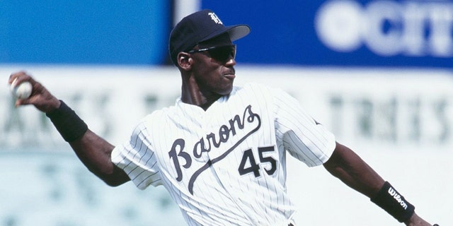 Michael Jordan, #45 of the Birmingham Barons, throws during an August 1994 game against the Memphis Chicks at Hoover Metropolitan Stadium in Hoover, Alabama.