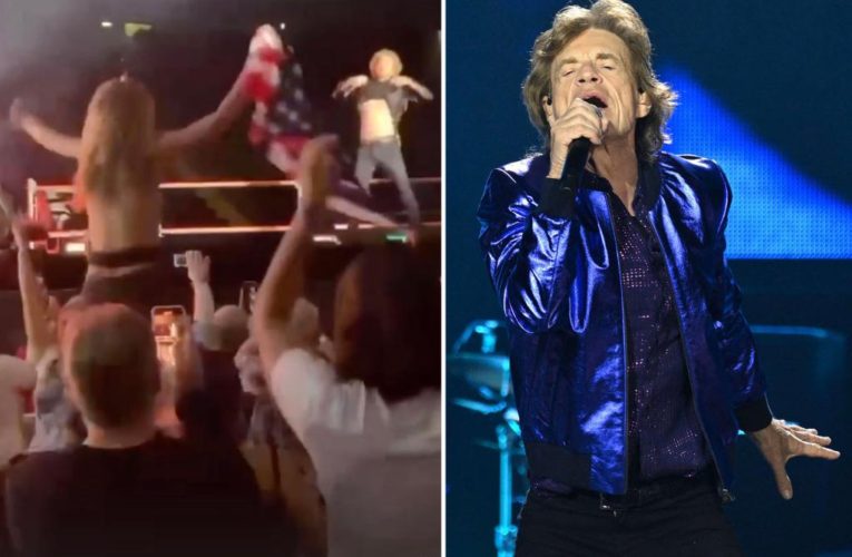 Mick Jagger shows nipples after being flashed by topless woman
