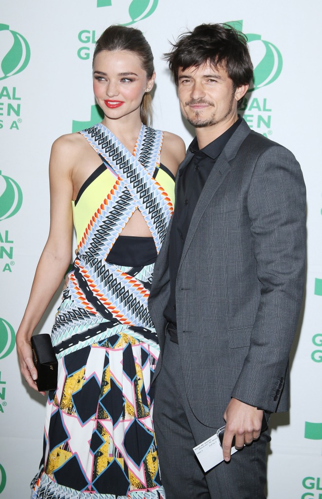 Miranda Kerr (left) and Orlando Bloom arrive at the Global Green USA's 10th Annual pre-Oscar party held at Avalon on February 20, 2013 in Hollywood, California. 