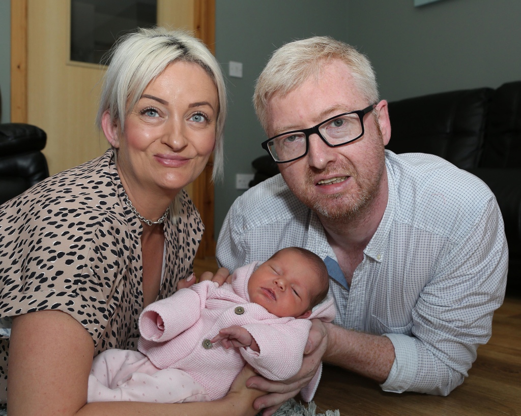 Alexis and Davie Brett with daughter, Cameron.