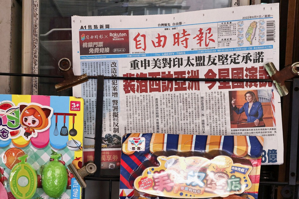 A newspaper front page reporting about U.S. House of Representatives Speaker Nancy Pelosi is pictured on the self of a store in Taipei, Taiwan, August 1, 2022. 