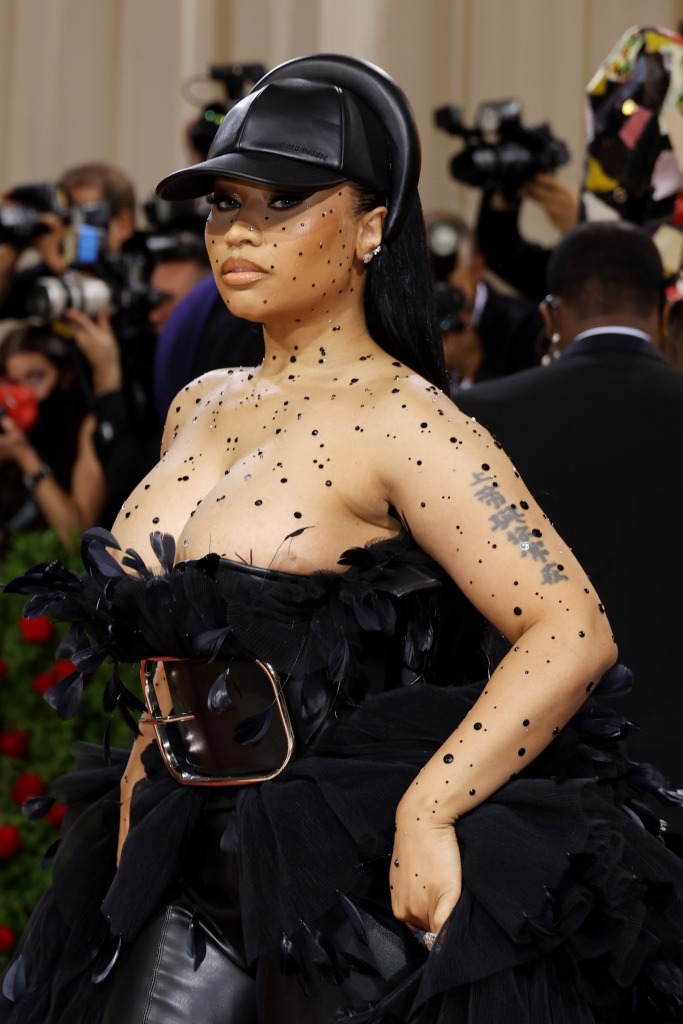 Not shy about flaunting her fabulous frame, Minaj gave 2022 MET Gala audiences more than an eyeful in her bosomy Burberry gown. 