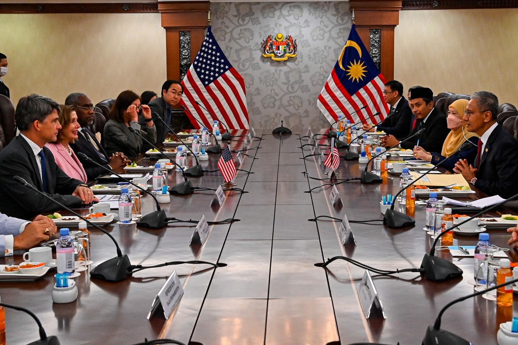 This handout photo taken and released by Malaysia’s Department of Information, U.S. House Speaker Nancy Pelosi, second left, meets with Malaysia Parliament speaker Azhar Azizan Harun, right, at the parliament house in Kuala Lumpur, Tuesday, Aug. 2, 2022. Pelosi arrived in Malaysia on Tuesday for the second leg of an Asian tour that has been clouded by an expected stop in Taiwan, which would escalate tensions with Beijing.