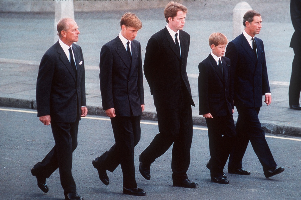 Prince Philip, the Duke of Edinburgh, Prince William, Earl Spencer, Prince Harry and Prince Charles, the Prince of Wales follow the coffin of Diana, Princess of Wales.