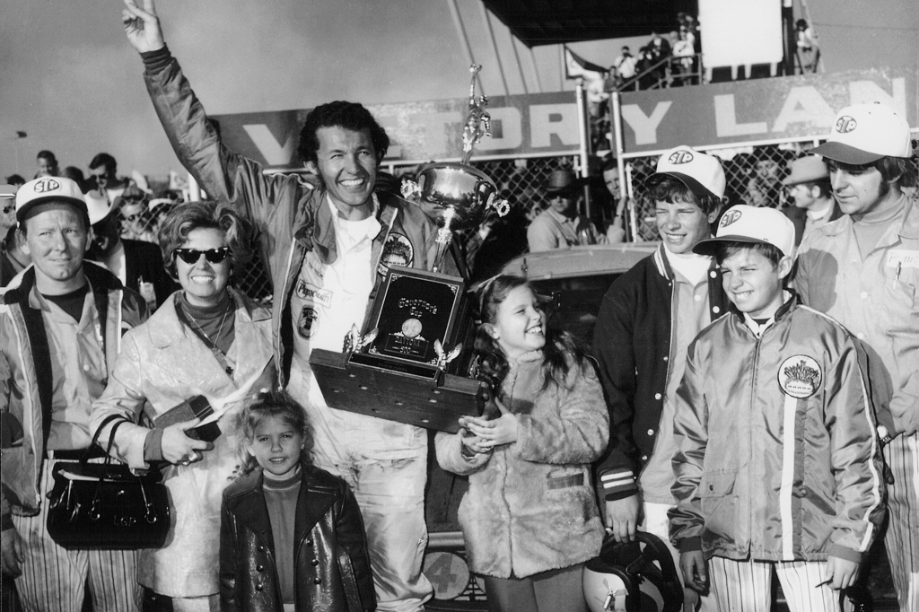 Kyle Petty saw his Uncle Randy (holding trophy in 1971, with a young Kyle next to him) die in an explosion at the 1975 Winston 500 race.