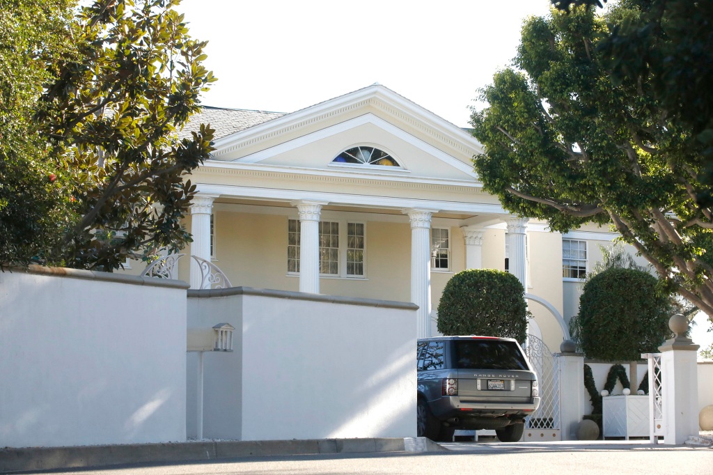 The exterior of Simmons' palatial Beverly Hills home is pictured. According to the new doc, the star is happily holed up in his home, enjoying a quiet life out of the spotlight. 