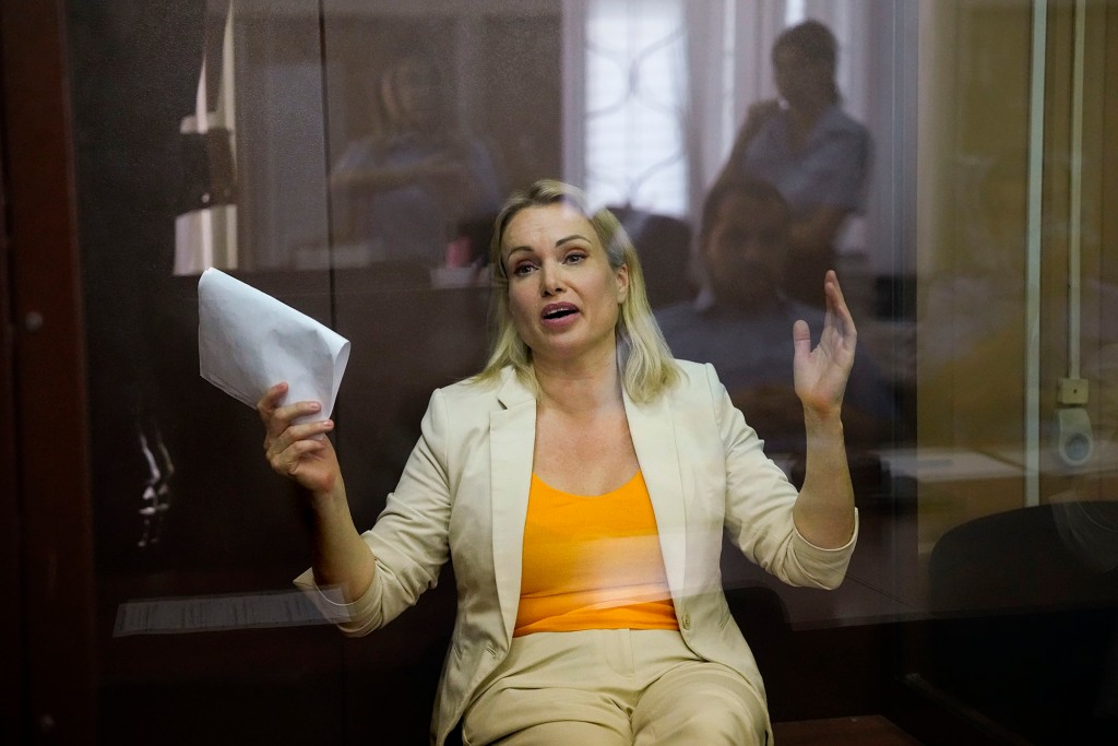 Marina Ovsyannikova gestures sitting in a court room during a hearing in Moscow, Russia on August 11, 2022.