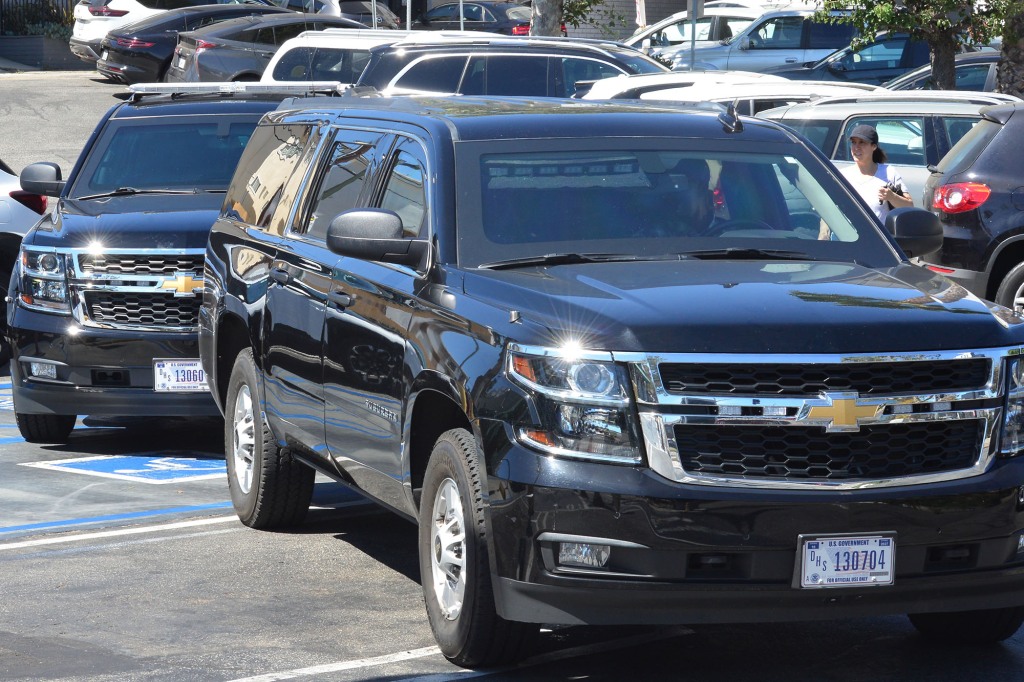 The two Secret Service vehicles were positioned diagonally over the specially designated spots during Emhoff's trip to the market on Wednesday.