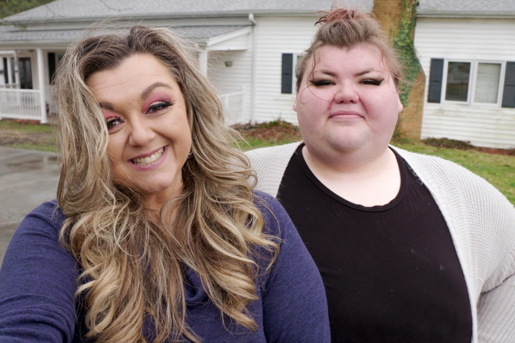 Angie and Shay take a selfie in their driveway. 