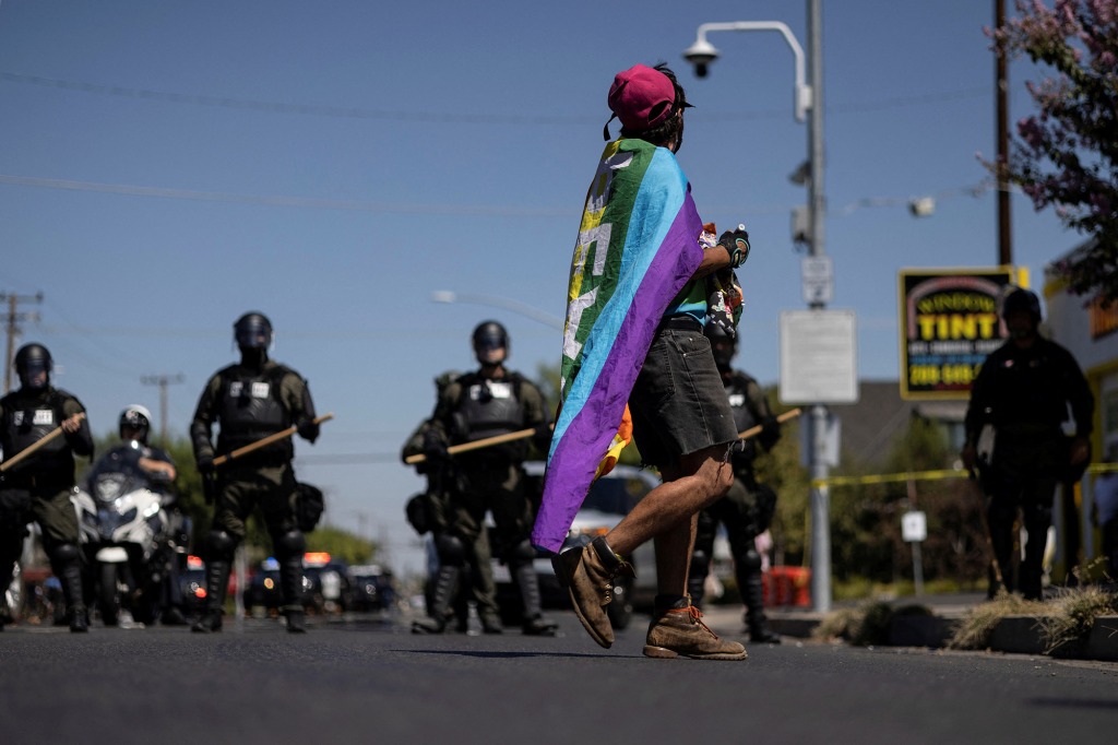 A counter-protester yells slogans against the police after a confrontation with Straight Pride Parade attendees during a rally outside a Planned Parenthood office in Modesto, California, U.S., August 27, 2022. 