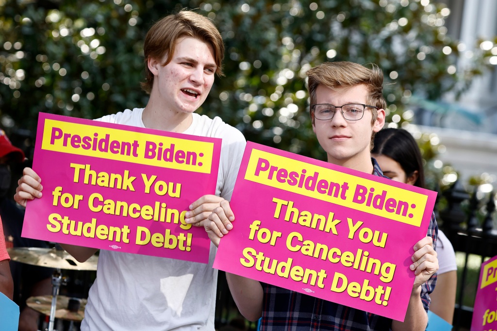 Student loan borrowers stage a rally in front of The White House to celebrate President Biden cancelling student debt.