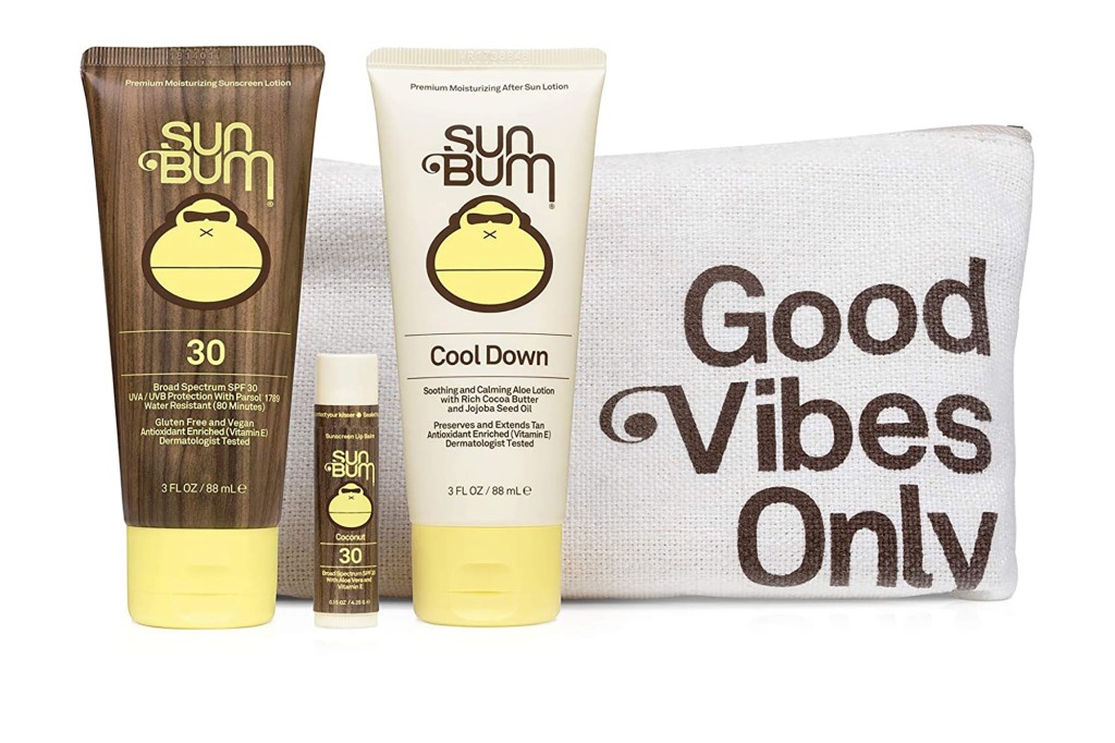A trio of Sun Bum sunscreen products and a carrier with " Good Vibes Only" on it 