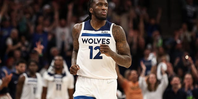 Taurean Prince #12 of the Minnesota Timberwolves looks on after making a three-point basket against the Memphis Grizzlies at Target Center on April 23, 2022, in Minneapolis, Minnesota. 