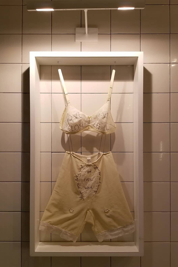 Framed, embroidered lingerie by artist Zoë Buckman was pilfered from Chef Laurent Tourdondel's The Vine in Chelsea.Created by Zoe Buckman
As seen in The Vine, New York, NY