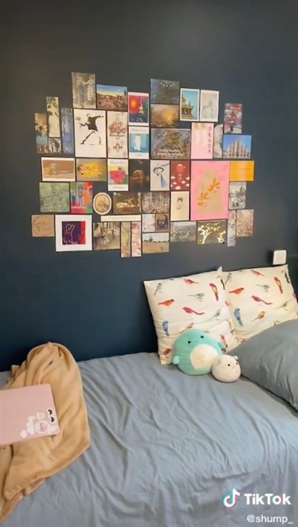 A cute collage is arranged over her small bed.