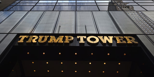 Wide angle front elevation of Trump Tower on Fifth Avenue Manhattan NYC