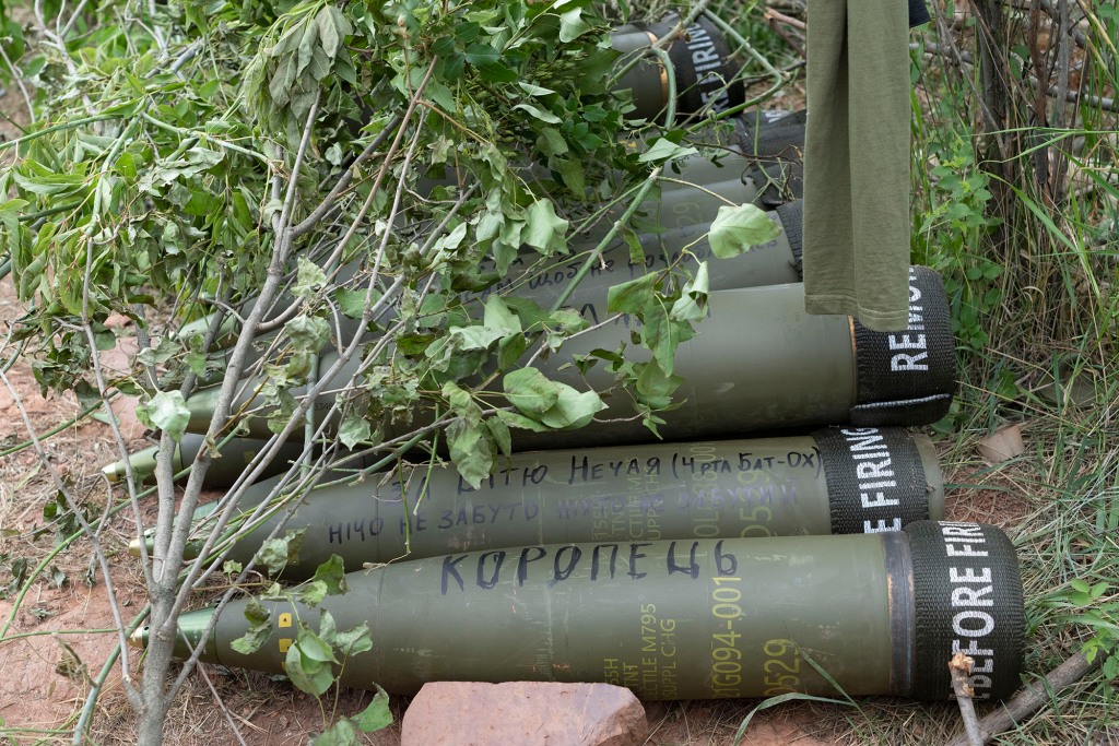 U.S.-supplied M777 howitzer shells lying on the ground.
