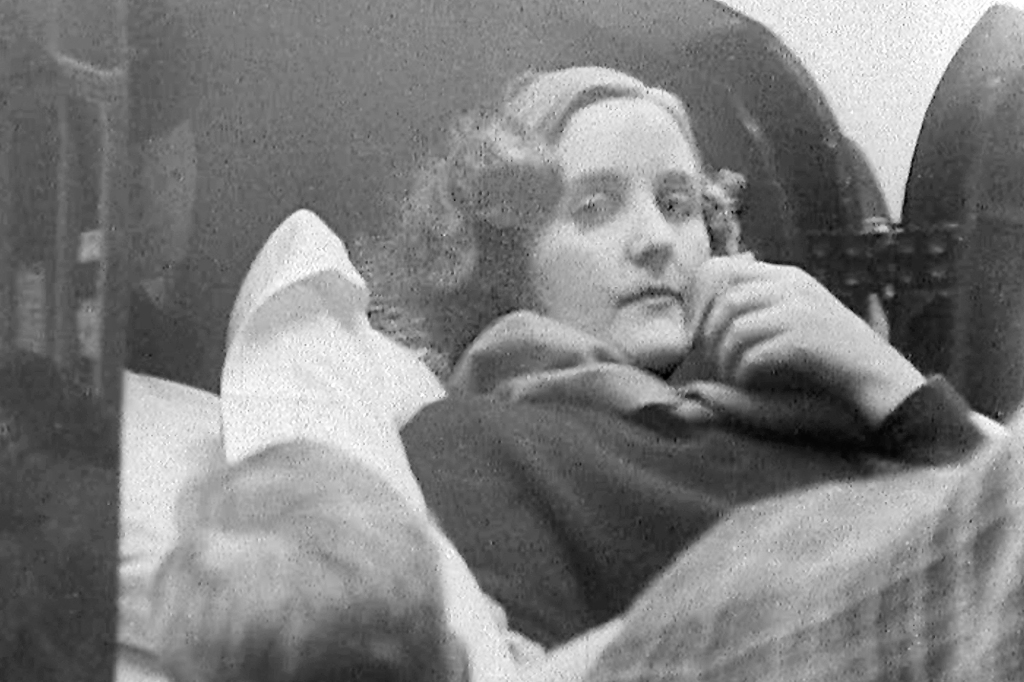Unity Mitford lying on a stretcher and being loaded into the back of an ambulance in Dover, England.