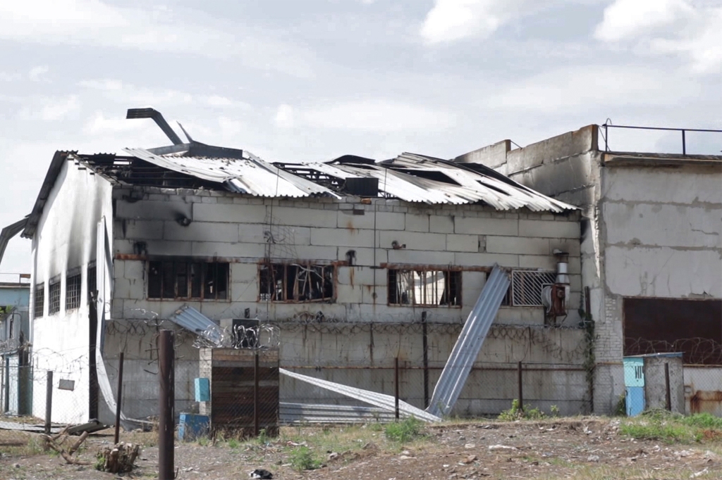 In this photo taken from video a view of a destroyed barrack at a prison in Olenivka, in an area controlled by Russian-backed separatist forces, eastern Ukraine, Friday, July 29, 2022.