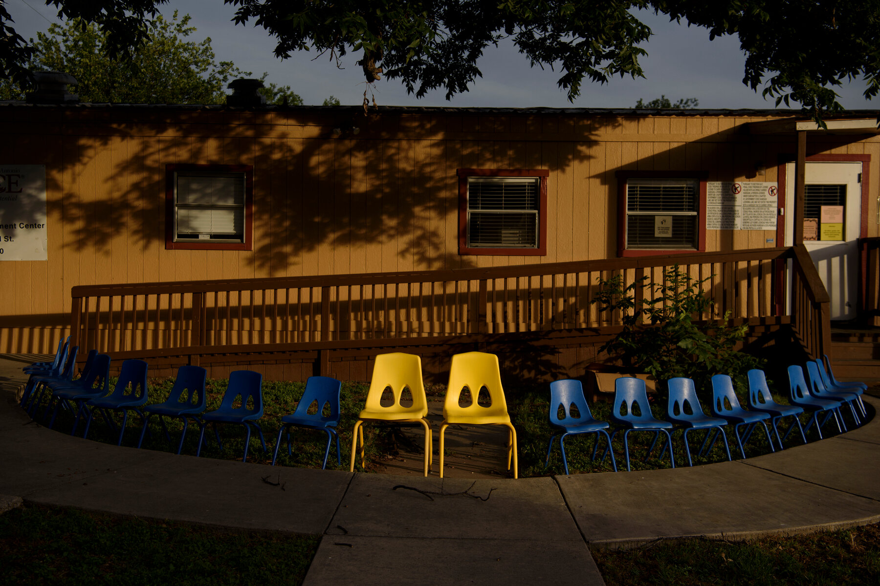 A memorial of 21 chairs was set up outside a Head Start building.