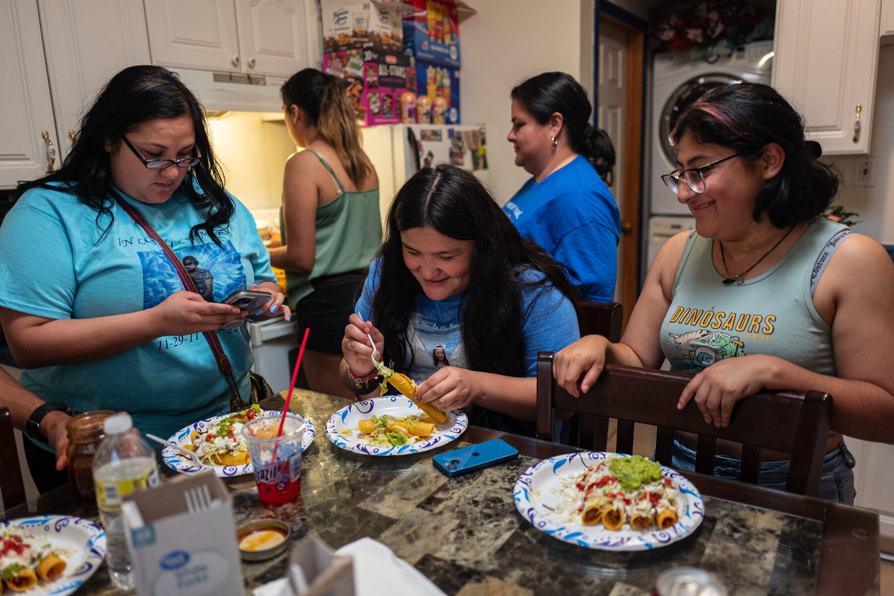 Jackie’s sister, Jazmin Cazares, 17, right, ate dinner with family members, Polly Alaniz, and Polly’s daughter Natalie, 12, at the Cazares family’s home.