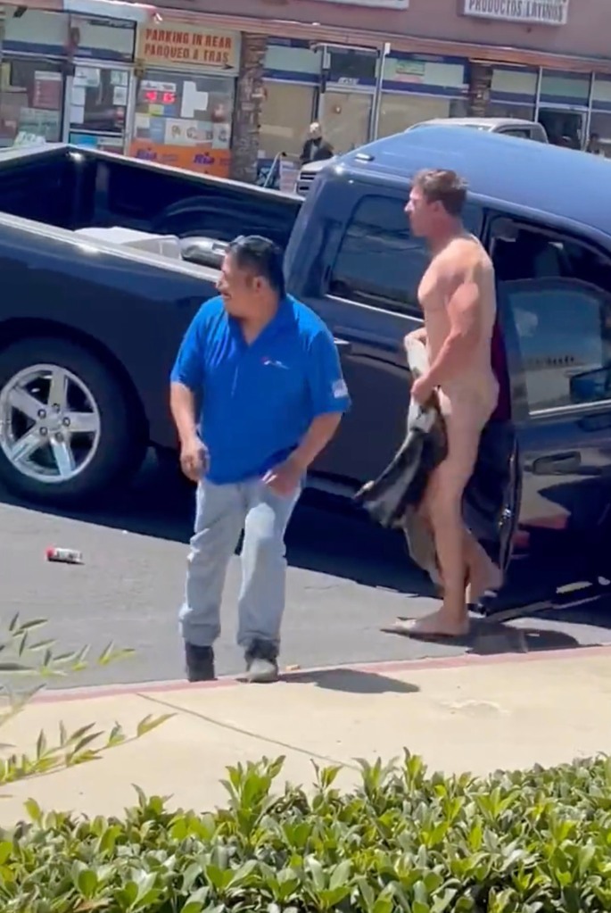 The naked man emerged from the vehicle apparently unscathed.