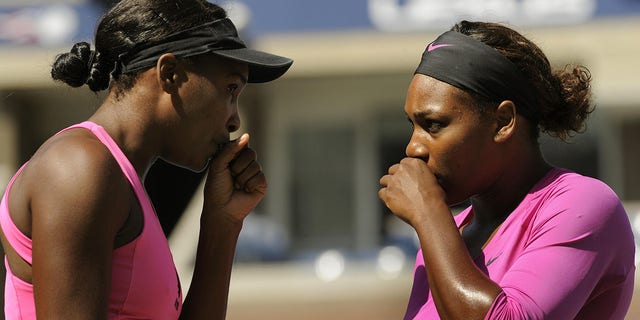 Serena Williams and  Venus Williams (US) against Cara Black (ZIM) and Liezel Huber (US) in the Women's Doubles Final US Open match at the USTA Billie Jean King National Tennis Center September 14, 2009 in  New York.